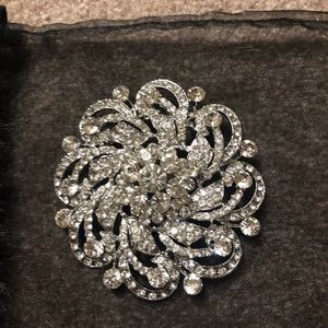 White silver brooch